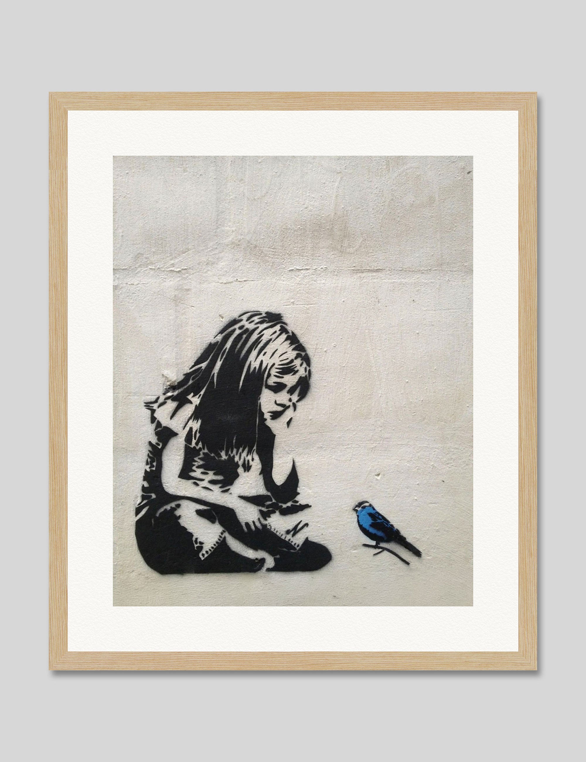 Girl With Blue Bird by Banksy Art Print in Natural Frame