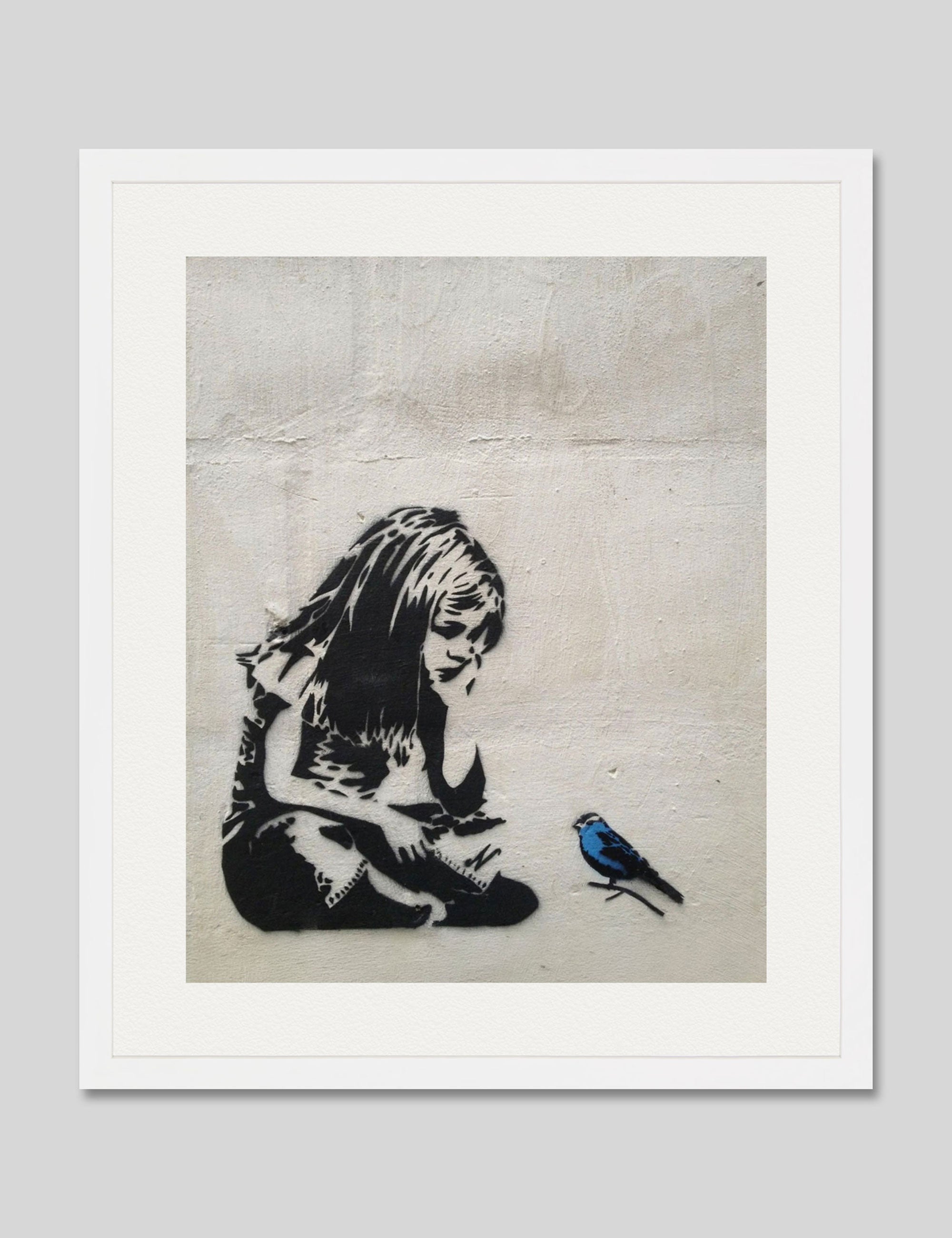 Girl With Blue Bird by Banksy Art Print in White Frame