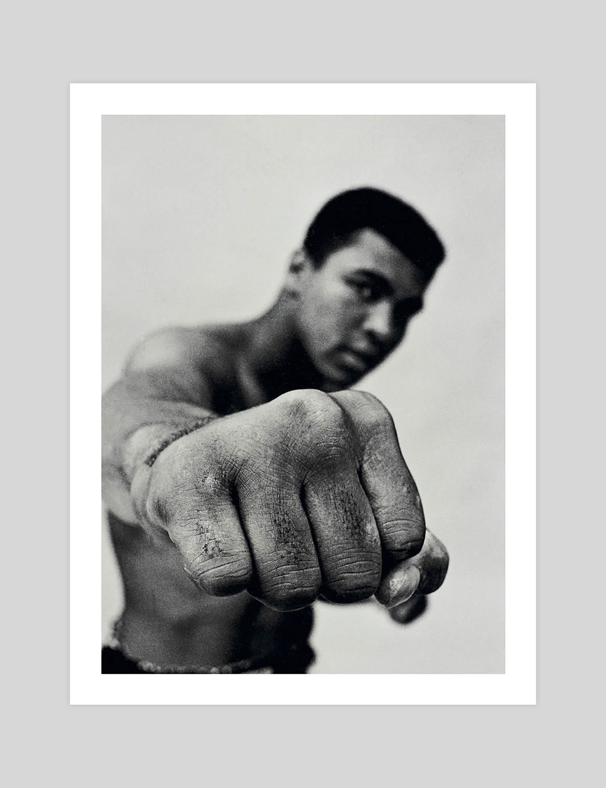 Muhammad Ali The Fist gallery quality art print produced using 100% cotton rag textured art paper and pigment based archival inks in New Zealand.